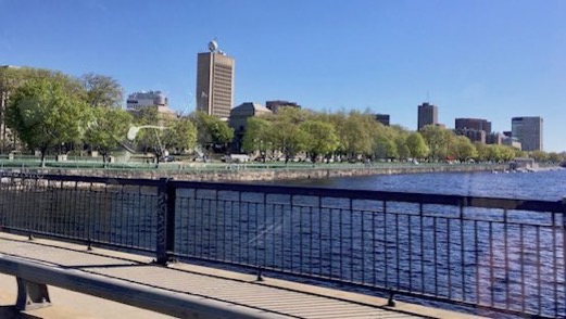 Photo of MIT campus against an incredible blue skey, as viewed while crossing the Charles River from Boston.